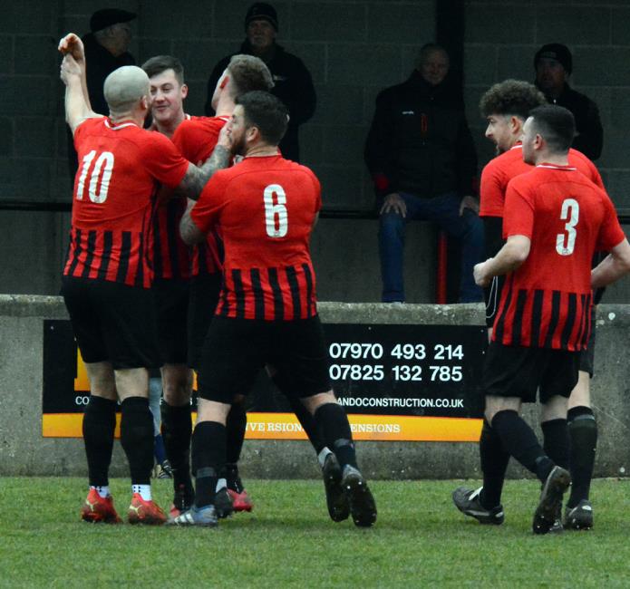Goodwick celebrate the opener scored by Rhys Jones against Carew
